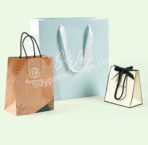 Luxury packing bag Custom logo gift bag glossy clothes branded retail shopping paper bags with rope handles