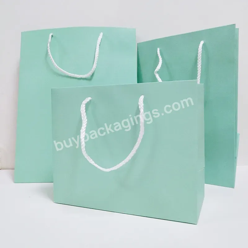 Manufacture Custom Reusable Retail Luxury Logo Printed Cardboard Paper Bags White Logo Boutique Shopping Paper Gift Carry Bags