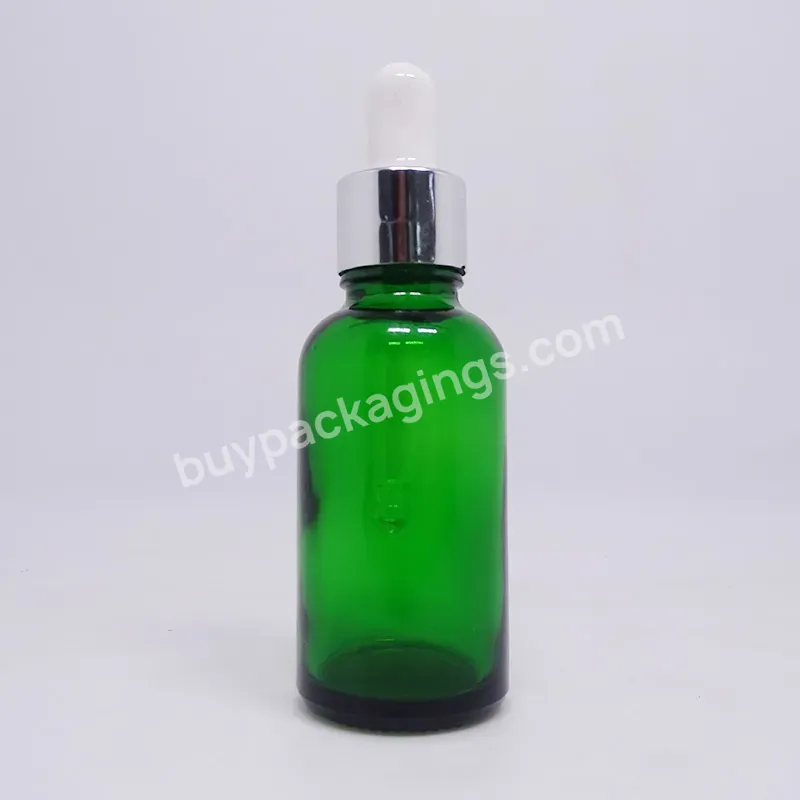 New Arrival 20ml 30ml 50ml 100ml Factory Produced Empty Glass Cosmetic Essential Serum Oil Amber Round Glass Bottle With Lids