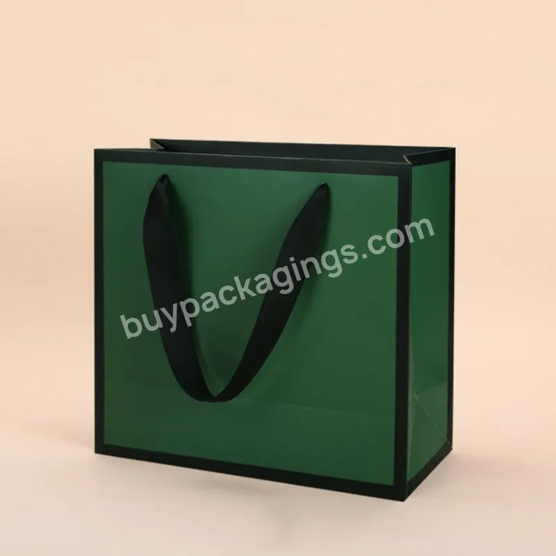 New Custom luxury recycled coated paper gift bag retail paper bags garments packaging bags with ribbon handle