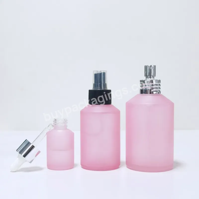 New Design Unique Design Slanted Shoulder Cosmetic Glass Bottles For Skin Care Packaging