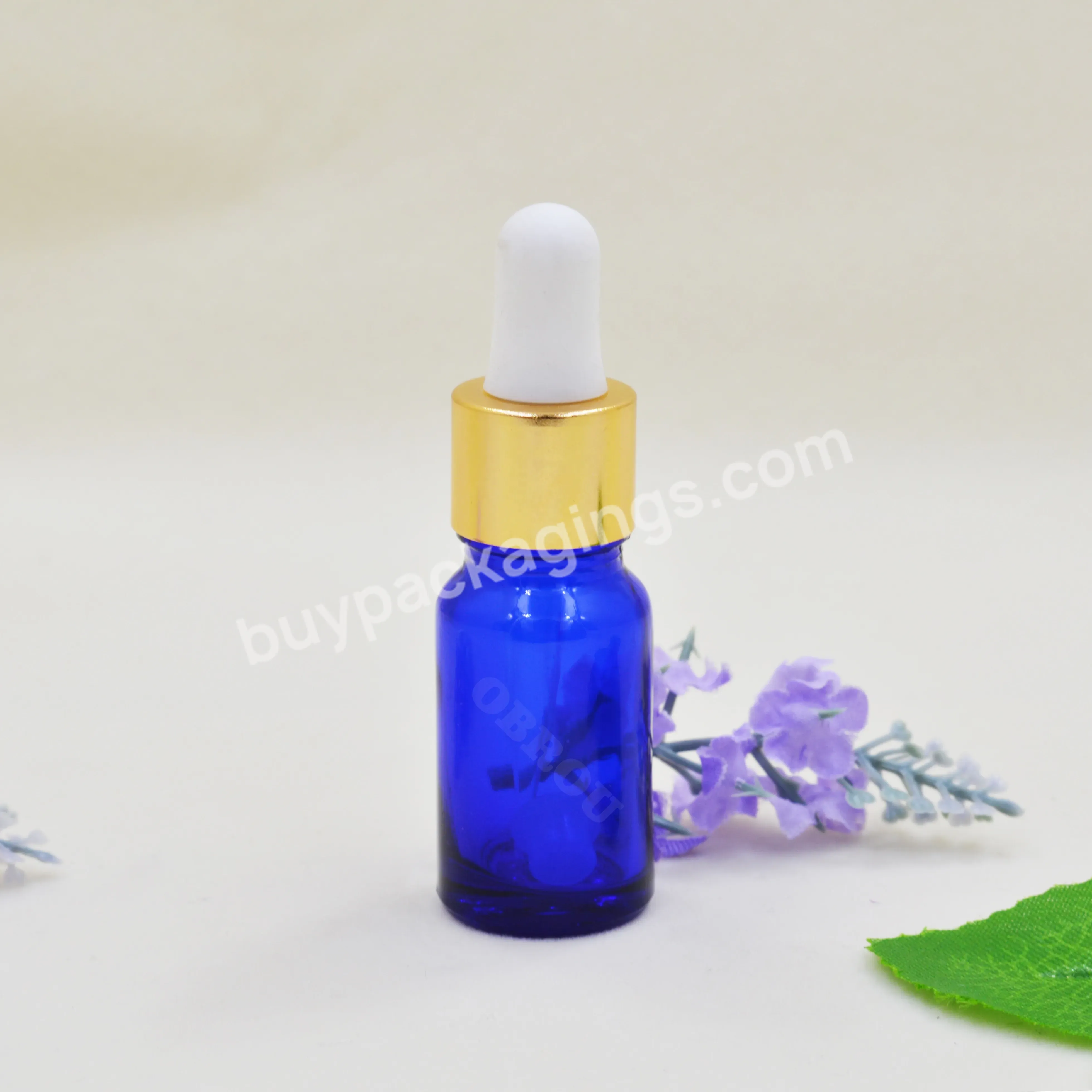 Obrou 5ml 10ml 15ml 20ml 30ml 50ml 100ml Wholesale Glass Cobalt Blue Essential Oil Bottle With Gold Collar