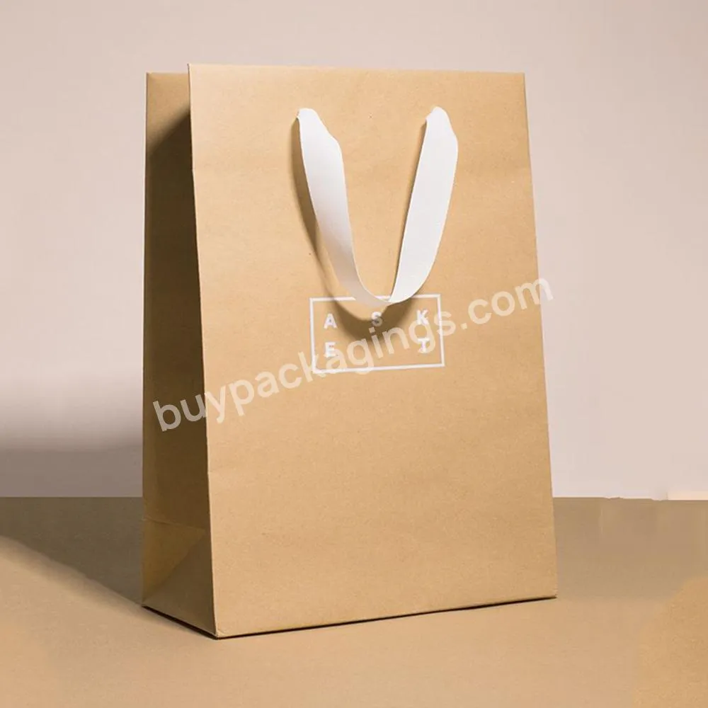 OEM Logo Luxury Kraft Paper Clothing Packaging Promotion Gift Shopping Bag With Ribbon Handle