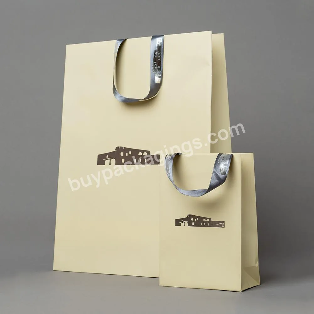 OEM Logo Luxury Kraft Paper Clothing Packaging Promotion Gift Shopping Bag With Ribbon Handle