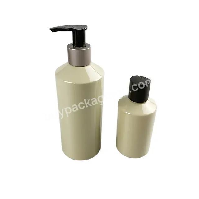 Oem Pcr Light Yellow Color Slide Shoulder Cosmetic Packaging Bottle 100ml 150ml 200ml 300ml 360ml With Shampoo Pump