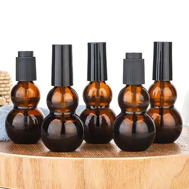 Popular Custom Logo Amber Color Gourd-shaped Nail Polish Glass Bottle