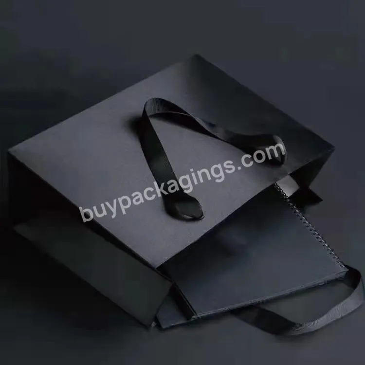Premium Silver Wholesale Bag Hot Foiled Stamping Black Matt Kraft Paper Bag With Cotton Rope Handles