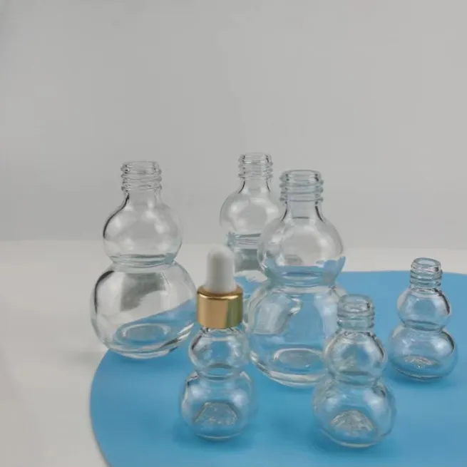 Professional Factory Directly Supply Transparent Double Gourd Multiple Capacity Essential Oil Glass Bottle