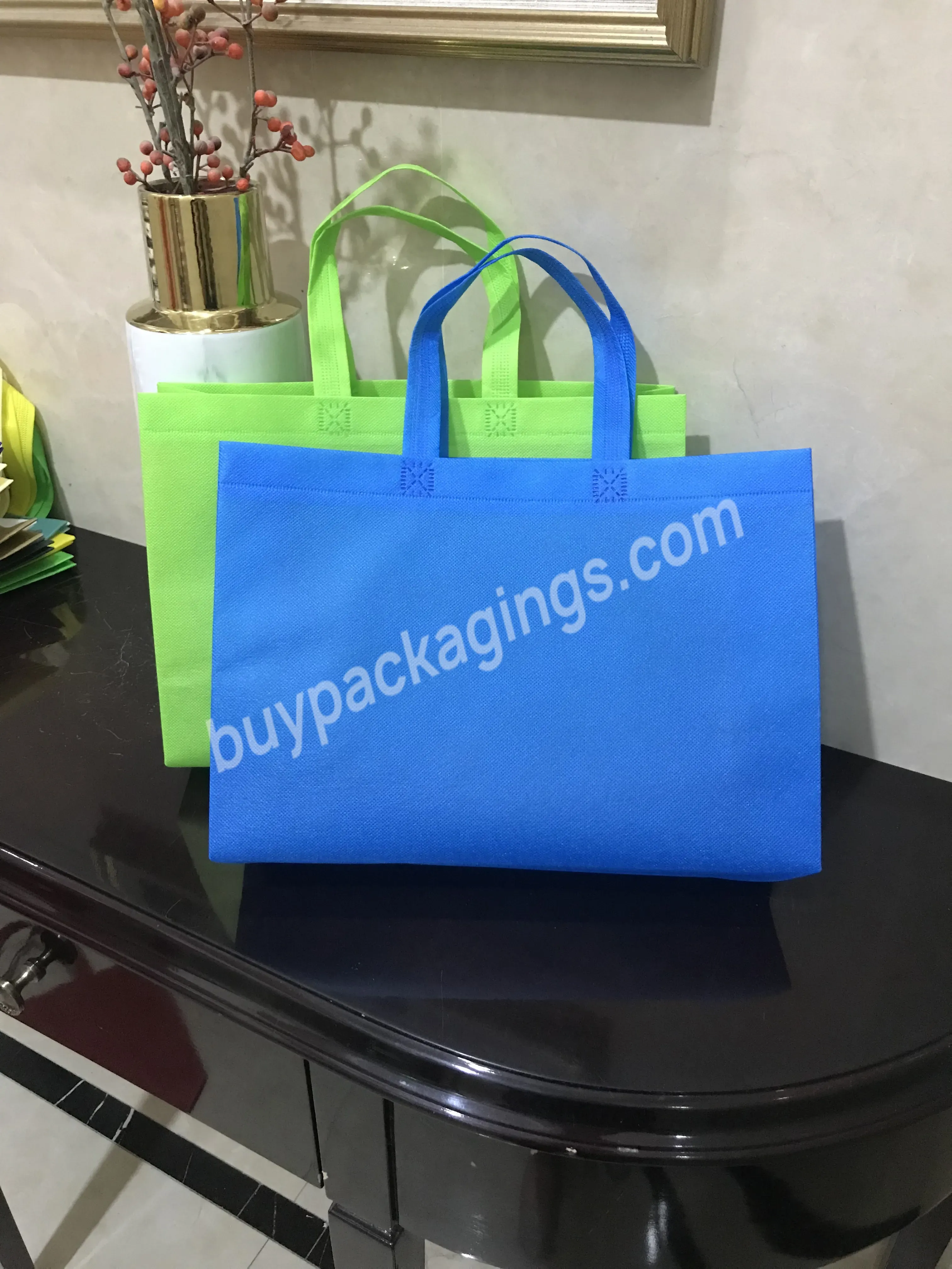 Promotional New Design Recyclable,Eco-friendly And Reusable Waterproof Customized Tote Shopping Bag Non Woven Bag With Handle