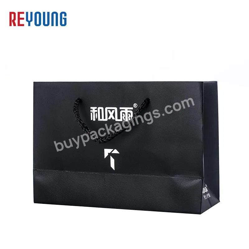 REYOUNG Black Customized Logos Luxury Cloth Packaging Men Shopping Paper Bag With Custom Printed