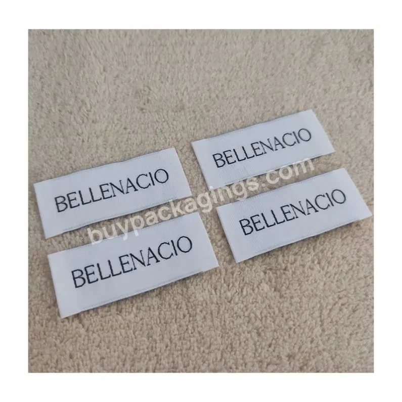 Sewing Woven Labels Or Ironing Woven Labels In Factory Custom Clothes