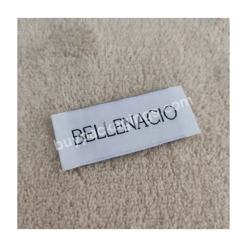 Sewing Woven Labels Or Ironing Woven Labels In Factory Custom Clothes