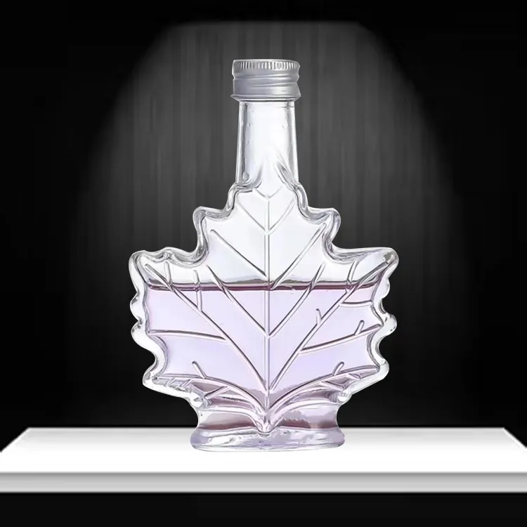 Transparent juice bottles free sample 50ml 100ml Maple Leaf shape fruit wine bottles Aromatherapy glass bottle