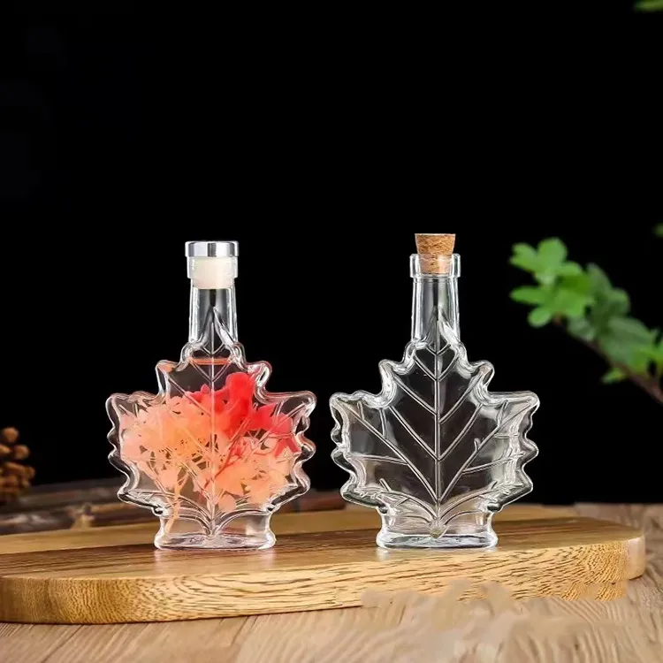 Transparent juice bottles free sample 50ml 100ml Maple Leaf shape fruit wine bottles Aromatherapy glass bottle