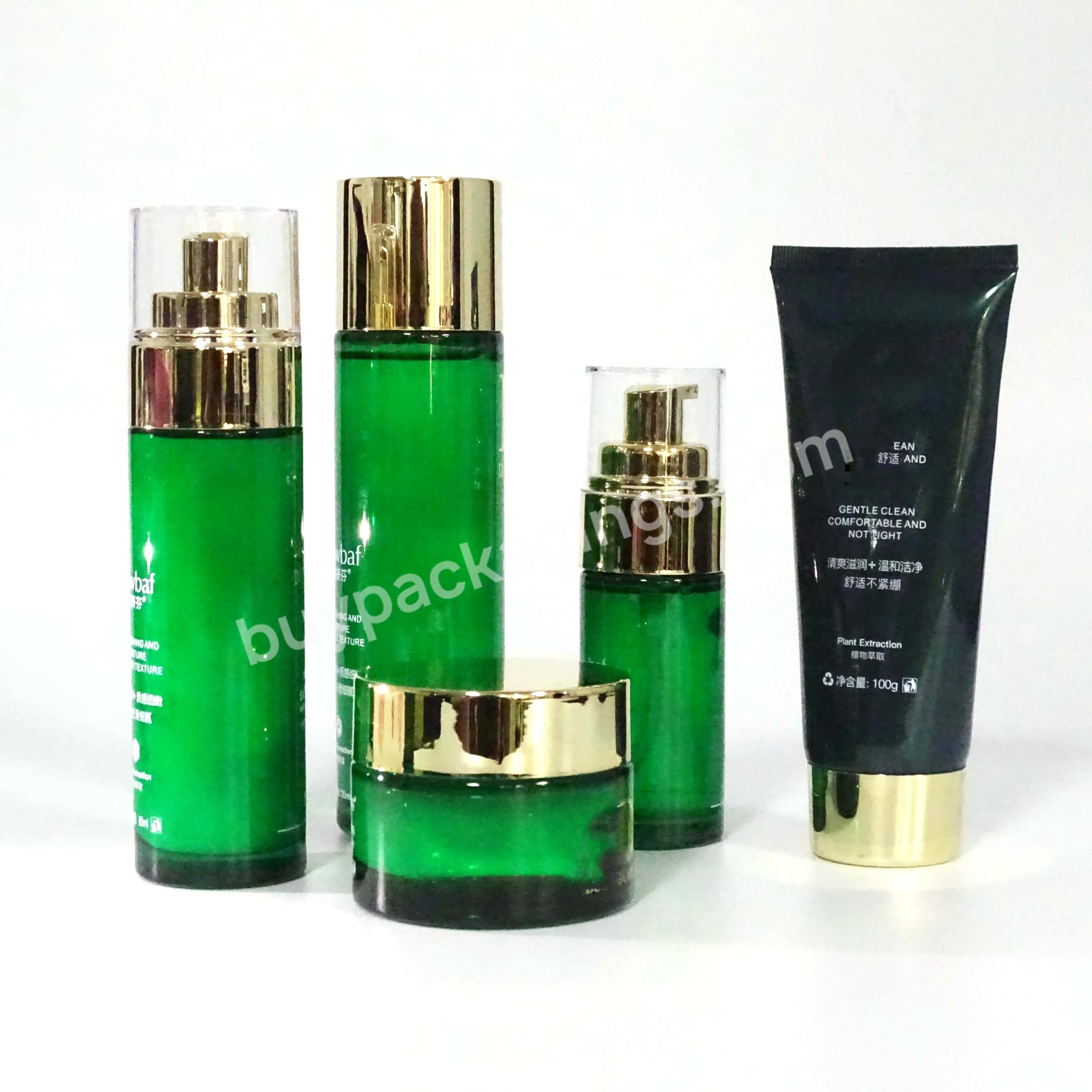 Unique Custom Cosmetic Glass Pump Bottle Green Color Cream Lotion Glass Bottle Jar Set With Pump And Dropper Lid