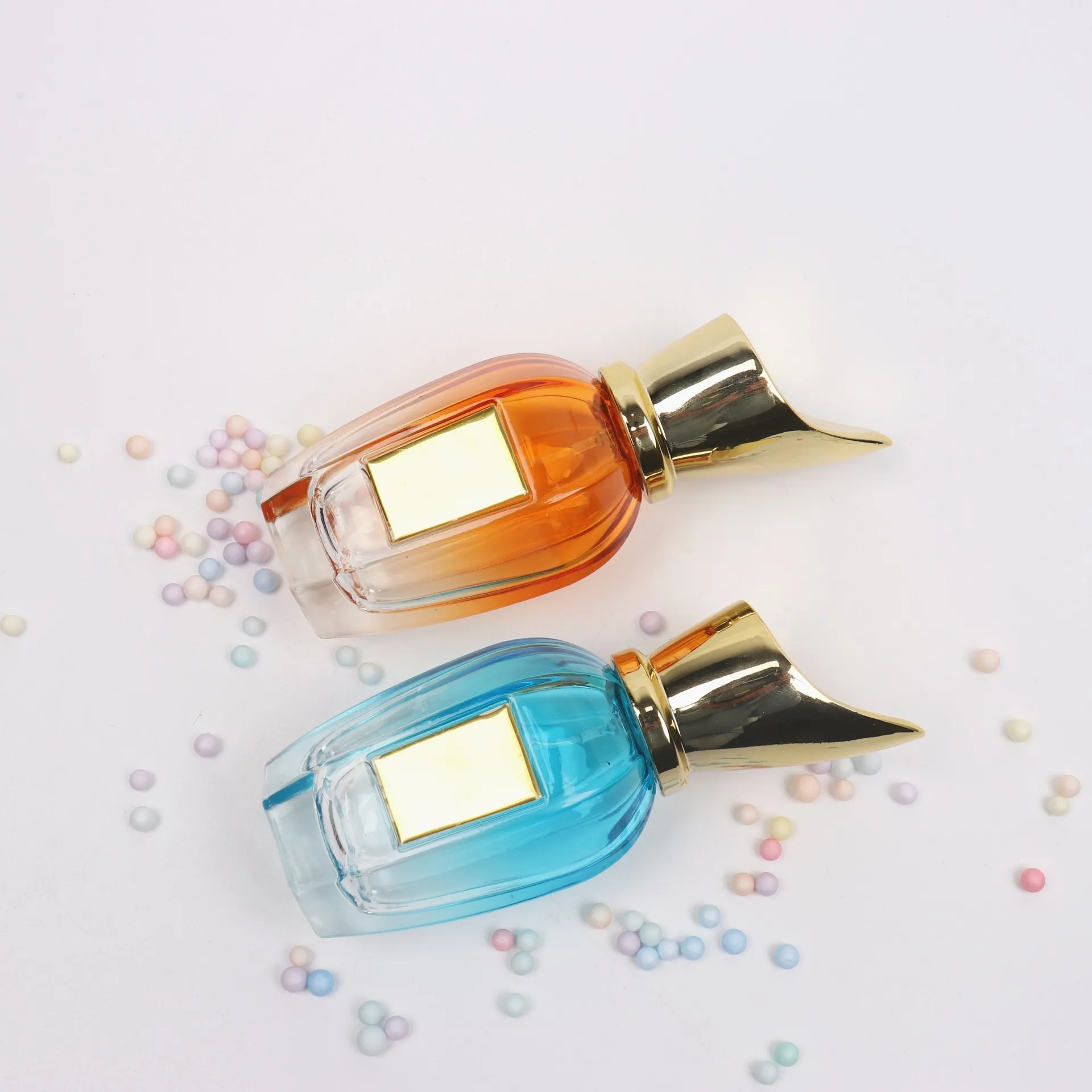 Wholesale 30ml 50ML Progressive Color Hexagonal Bottom Glass Material Perfume Bottle with Pipe Cap