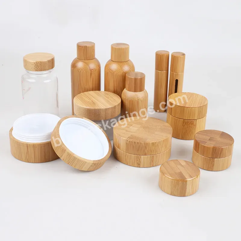 Wholesale Bamboo Cosmetic Packaging Skin Care Set Frosted Cream Jars And Spray Lotion Glass Bottles With Bamboo Ring Lid