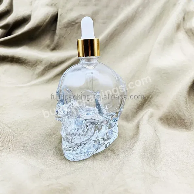 Wholesale Bottle Skull Shape Glass Bottle Glass Dropper Bottle Cosmetic Packaging