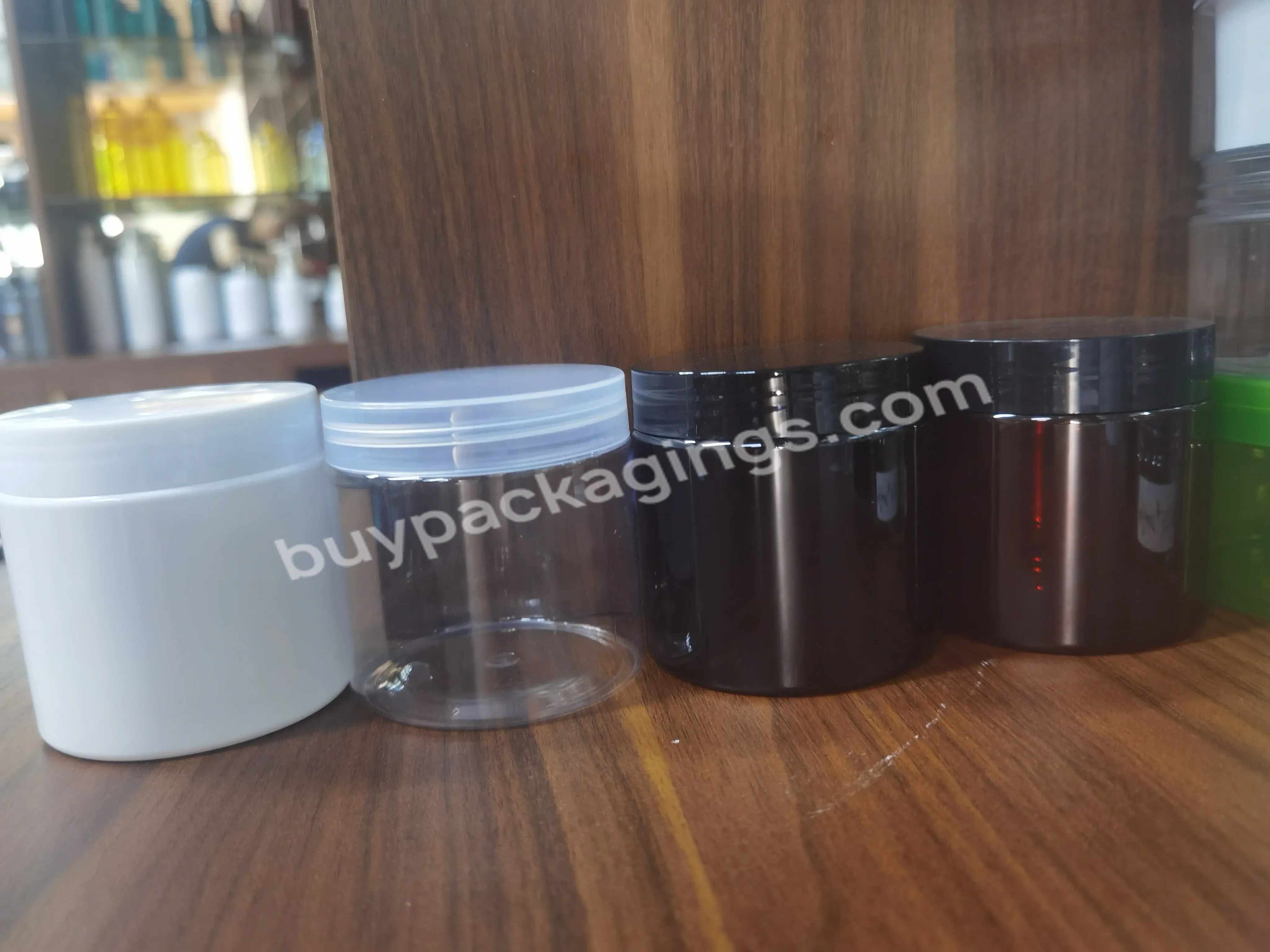 Wholesale Cosmetic Food Packaging 100ml 150ml 200ml 250ml 300ml Amber Black Pet Plastic Cosmetic Cream Jar With White Black Lid