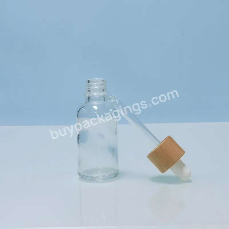 Wholesale Custom Colorful Printed 30ml 1oz Essential Oil Transparent Glass Dropper Bottle With Bamboo Lid