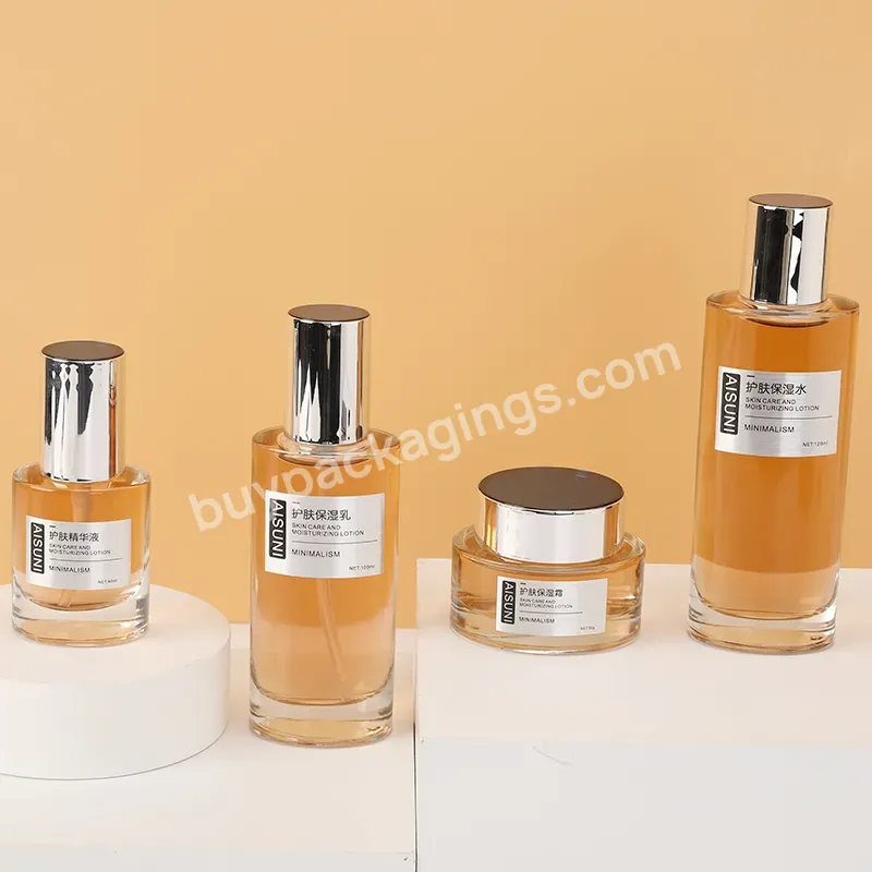 Wholesale Empty Luxury Skincare Packaging Set Empty Lotion Pump Glass Bottle And Jar Cosmetic Cream Bottle With Plastic Pump