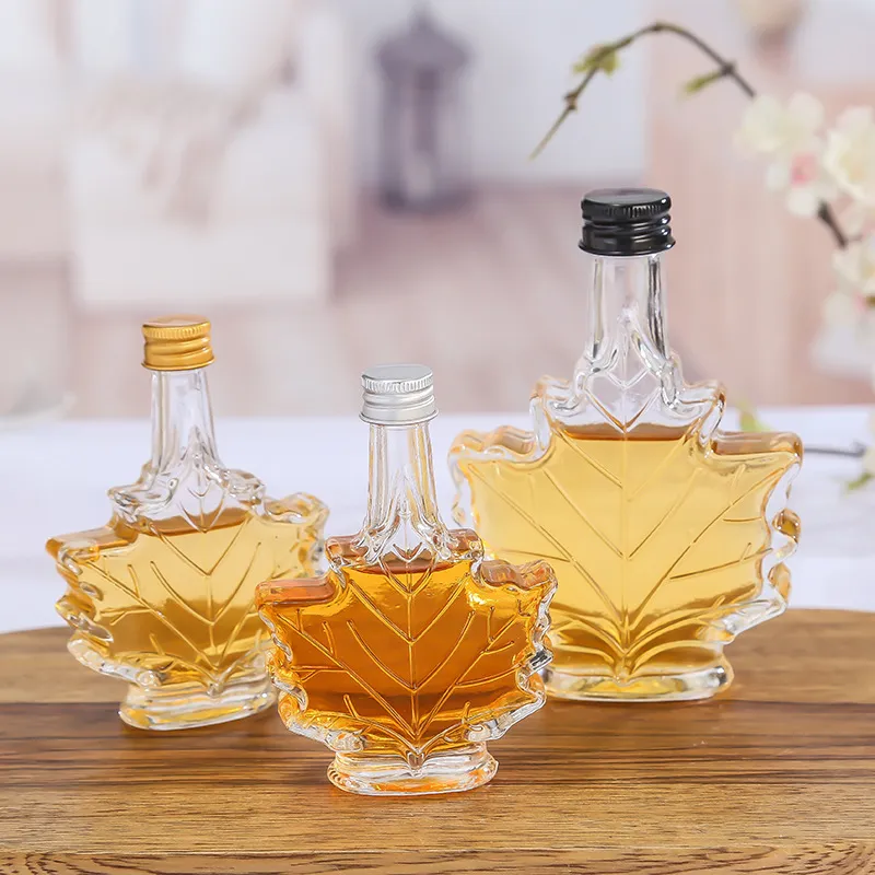 Wholesale glass bottle manufacturers 500ml beverage empty wine bottle Canadian Maple Leaf glass bottles