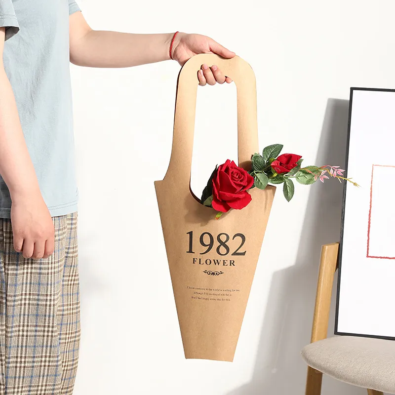 Wholesale logo paper portable packaging bag Simple bouquet floral packaging creative carrier bag rose flower handle gift bag