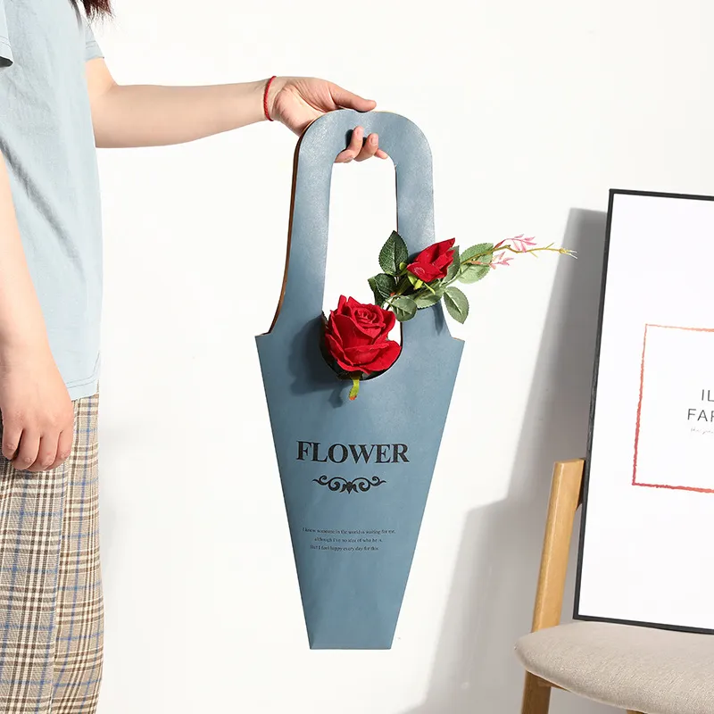 Wholesale logo paper portable packaging bag Simple bouquet floral packaging creative carrier bag rose flower handle gift bag