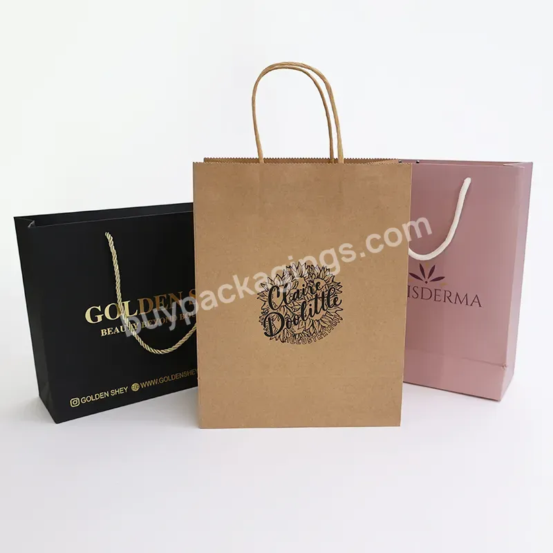 Wholesale Luxury Clear Printed Logo Recyclable Easy Carry Clothing Shopping Gift Paper Packaging Bags