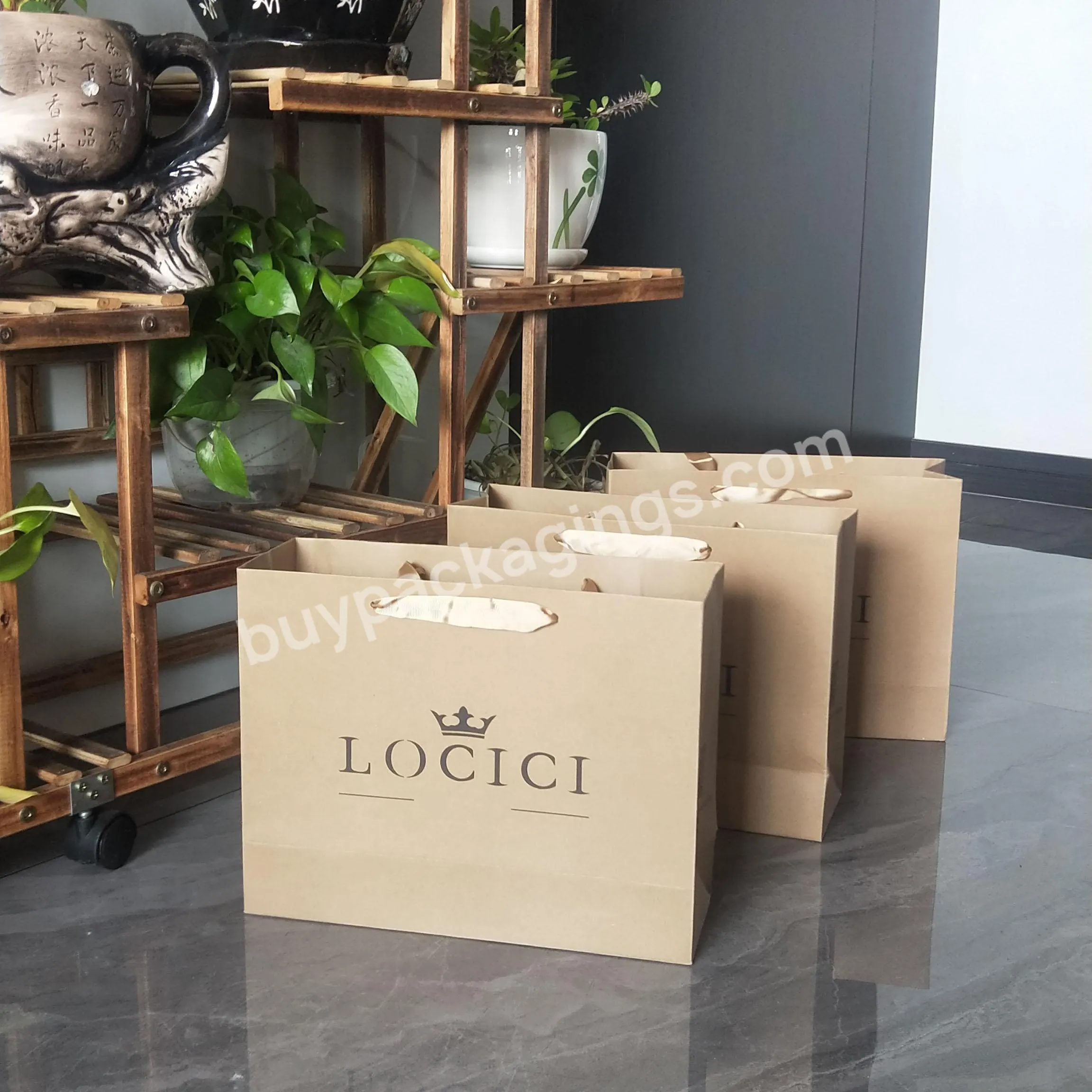 Wholesale Printed Luxury Paper High-end Celebration Packaging Cardboard Shopping Gift Bag With Custom Logo