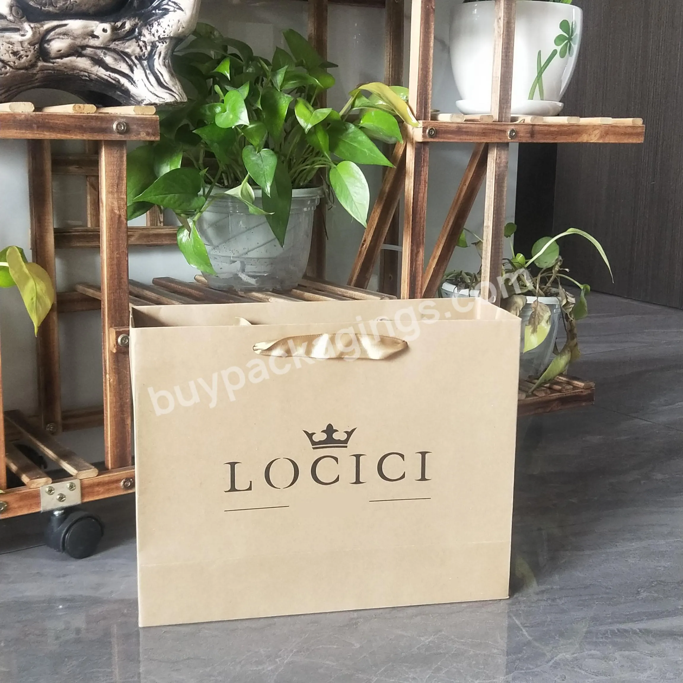 Wholesale Printed Luxury Paper High-end Celebration Packaging Cardboard Shopping Gift Bag With Custom Logo