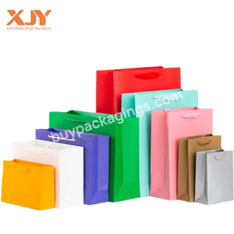 Xjy Logo Printing Eco Friendly Acceptable Bag Kraft Paper Shoes Clothing Custom Hanldle Gift Bags With Business Logo
