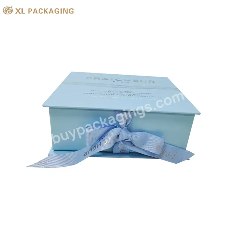 Blue Skin Care Box Packaging Book Shape Cosmetic Box Custom Logo Beauty Paper Box For Glass Bottle With Ribbon Closure