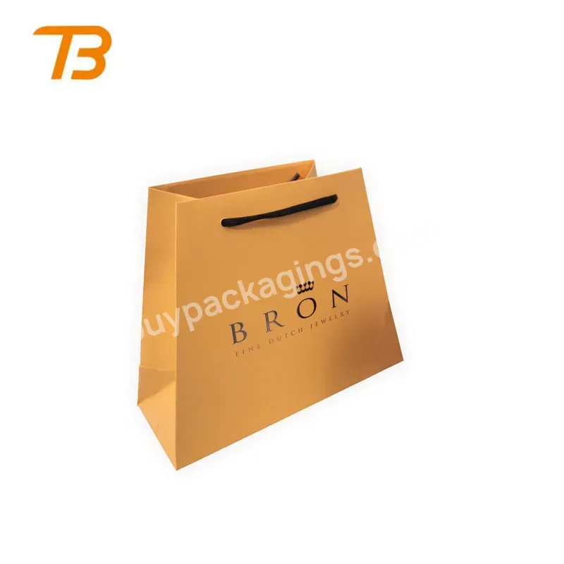 China Factory Low Cost Custom Made Brand Name Craft Foldable Shopping Kraft Paper Bags