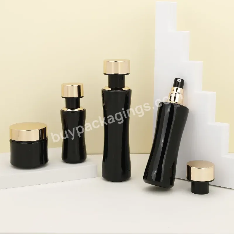 Luxury Unique Black Empty Glass Cosmetics Bottles Packaging Collection Black Gold Cosmetic Jar Skincare Lotion Bottle With Pump