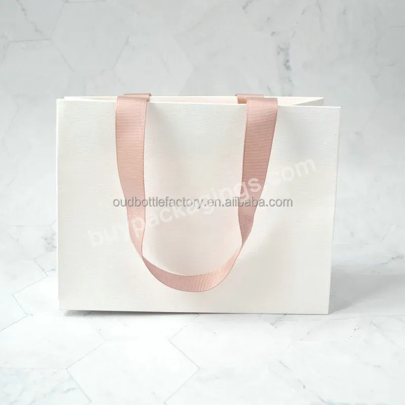 Wholesale Luxury Black Shoes Clothes Packing Paper Bags Printed Custom Logo Clothing Shopping Gift Jewelry Packaging Paper Bag - Buy Packaging Paper Bag,Jewelry Packaging Paper Bag,Small Gift Paper Bags.